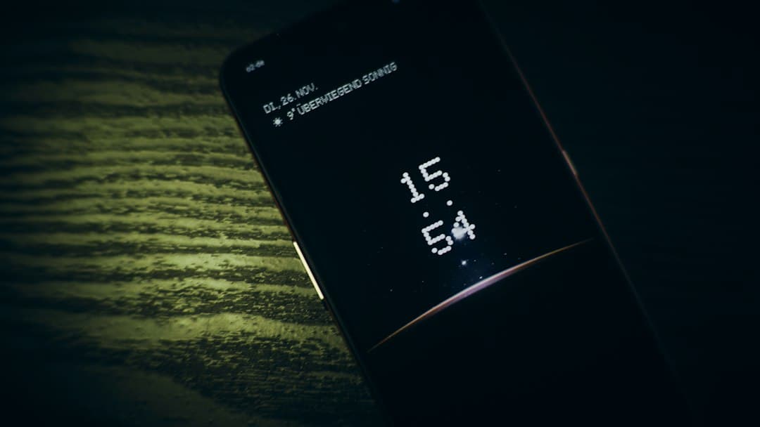Smartphone with notifications on a nightstand in soft light, showing the time 3:54 pm